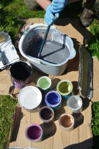 mixing ends of paint tins